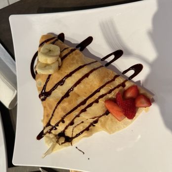 Redondo Coffee & Crepes - Strawberry and bananas crepe with chocolate and condensed milk, I was worried it will be too sweet but it was perfect - Coffee & Tea Near Me - Renton, Washington Redondo Coffee & Crepes - Strawberry and bananas crepe with chocolate and condensed milk, I was worried it will be too sweet but it was perfect - Coffee & Tea Near Me - Renton, Washington