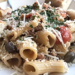 Spaghetteria - Pasta w/ sausage, red onions, olives, tomatoes & Pecorino cheese
