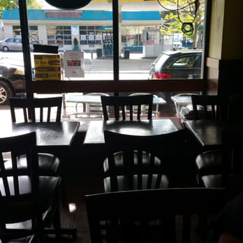 Bonjour Montclair Cafe - Front has six tables for pairs of two. - Creperies Near Me - Montclair, New Jersey