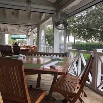 George's At Alys Beach - Early lunch view of the front porch seating in February. Usually a packed house by noon. - New American Near Me - Alys Beach, Florida George's At Alys Beach - Early lunch view of the front porch seating in February. Usually a packed house by noon. - New American Near Me - Alys Beach, Florida