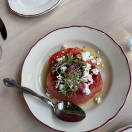 Watermelon feta salad with the perfect amount of harissa.