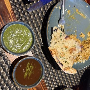 Holi Indian Grill - Mint and tamarind sauce and garlic naan basmati rice chicken korma - Indian Near Me - Panama City, Florida