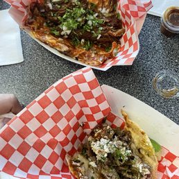 Quesabirria taco and carne asada taco.