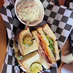 Stacked Sandwiches & More - Club sandwich on white with potato salad