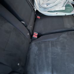 A+ Paint Correction and Detailing - After - a backseat that almost looks a different color than before!