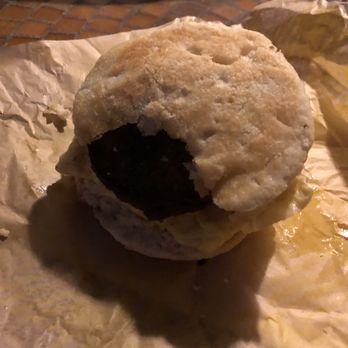 Bojangles - Sausage & Egg Biscuit with a bite taken out at store. - Fast Food Near Me - Marietta, Georgia Bojangles - Sausage & Egg Biscuit with a bite taken out at store. - Fast Food Near Me - Marietta, Georgia