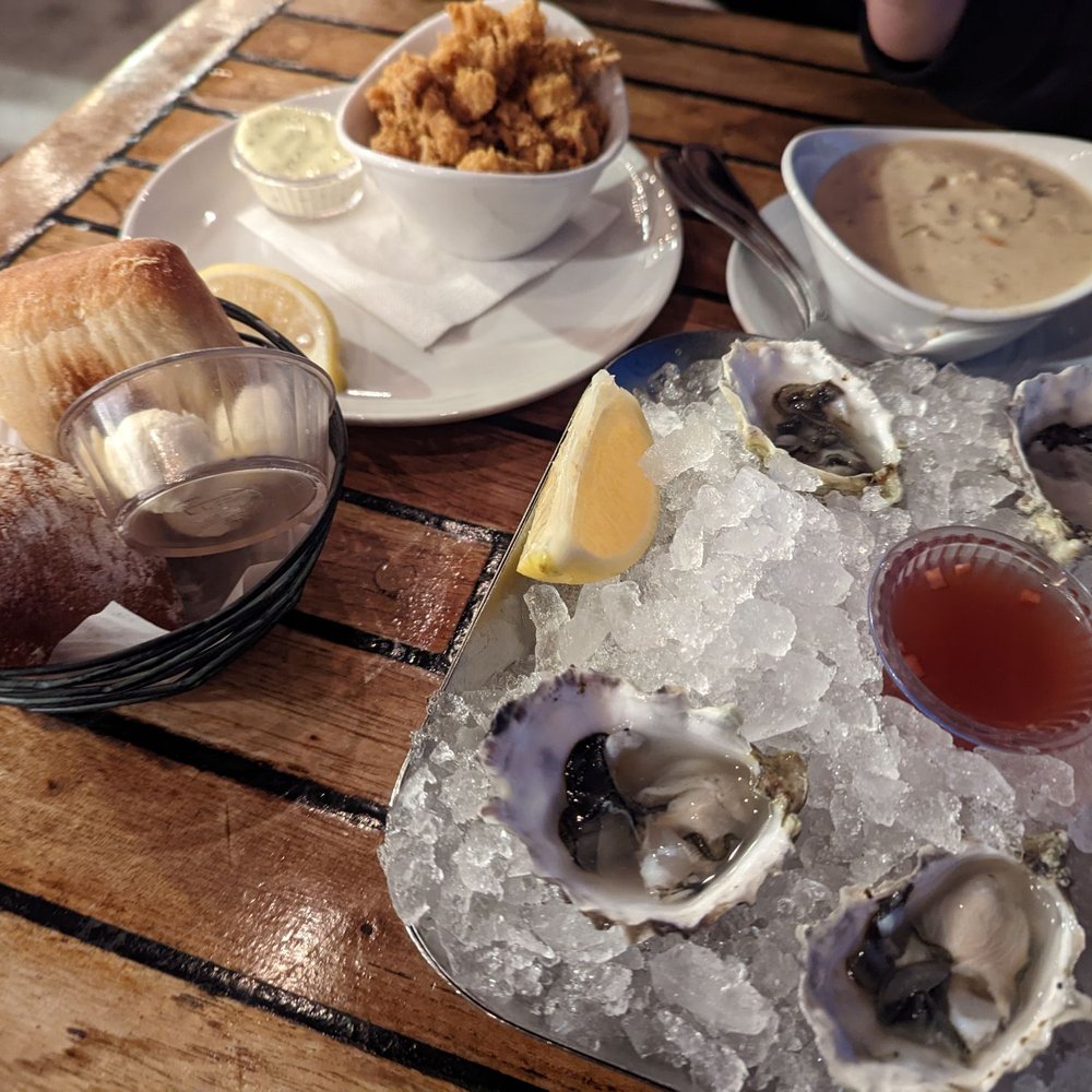 Ray's Café - Happy Hour Calamari, Clam Chowder, Chest Creek Oysters, Bread Roll + Butter - Seafood Near Me - Seattle, Washington Ray's Café - Happy Hour Calamari, Clam Chowder, Chest Creek Oysters, Bread Roll + Butter - Seafood Near Me - Seattle, Washington
