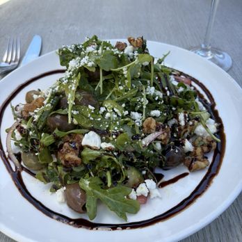 The Landing RoofTop - Watermelon and feta salad with candied walnuts, cucumbers, olives and red onion. No salt and pepper needed as the dressing is so balanced. - Comfort Food Near Me - Melbourne, Florida