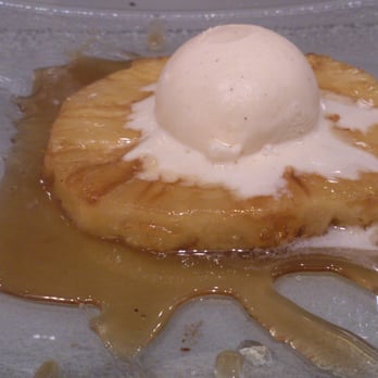 Toucan Sur Mer - Grilled pineapple with vanilla ice cream and honey - Brasseries Near Me - Ixelles, BRU Toucan Sur Mer - Grilled pineapple with vanilla ice cream and honey - Brasseries Near Me - Ixelles, BRU
