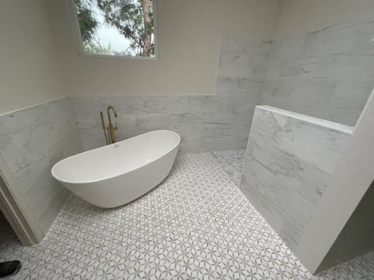 Shower Tile and Tub Enclosures - Transform your bathroom with our custom shower and bath enclosures! We expertly design and install tile, marble, and stone enclosures that are both functional and stunning, tailored to your space and style. Trust us for watertight, beautiful finishes that last—showcasing our four decades of tile artistry. Shower Tile and Tub Enclosures - Transform your bathroom with our custom shower and bath enclosures! We expertly design and install tile, marble, and stone enclosures that are both functional and stunning, tailored to your space and style. Trust us for watertight, beautiful finishes that last—showcasing our four decades of tile artistry.