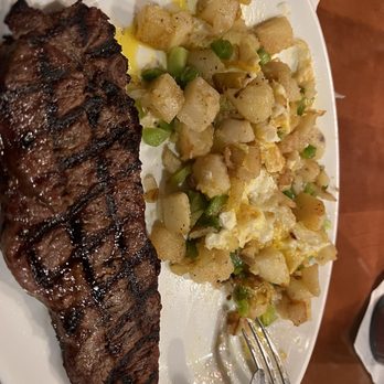 Village Pub Rainbow - Steak and eggs with onion and peppers. Sorry Eggs already mixed in they were over easy to make a mini skillet! - Pubs Near Me - Las Vegas, Nevada Village Pub Rainbow - Steak and eggs with onion and peppers. Sorry Eggs already mixed in they were over easy to make a mini skillet! - Pubs Near Me - Las Vegas, Nevada