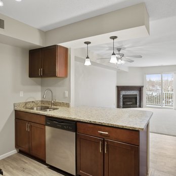 Waterford Place Townhomes - Kitchens are complete with rangehood microwave, electric stove and range, dishwasher, and fridge/freezer. - Apartments Near Me - Eagan, Minnesota Waterford Place Townhomes - Kitchens are complete with rangehood microwave, electric stove and range, dishwasher, and fridge/freezer. - Apartments Near Me - Eagan, Minnesota