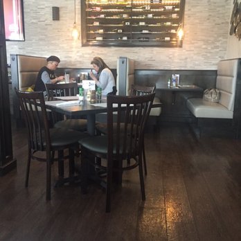 Mr. Ventry's Pizza on the Boulevard - Wall of wines. Different  look Booths are comfortable  Restrooms are spotless  They are constantly cleaning. - Pizza Near Me - Niagara Falls, New York