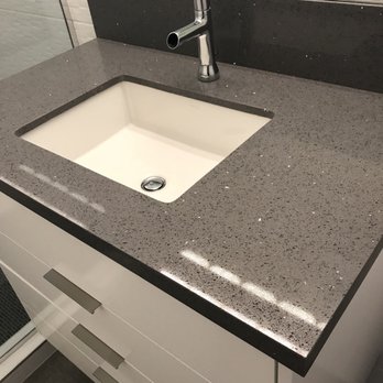 Greenguys Construction - a sink and shower in a bathroom - General Contractors Near Me - Palm Springs, California Greenguys Construction - a sink and shower in a bathroom - General Contractors Near Me - Palm Springs, California