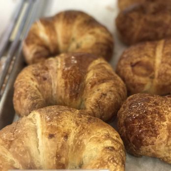 US Donuts - croissants in a display case - Donuts Near Me - Riverside, California