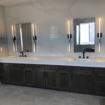 State Construction - a bathroom with double sinks and mirrors - General Contractors Near Me State Construction - a bathroom with double sinks and mirrors - General Contractors Near Me