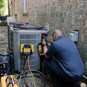 Air Pro Solutions - HVAC tech Efer diagnosing an outdoor AC condenser, testing wiring and checking refrigerant pressures with digital manifold gauges. - Heating & Air Conditioning/HVAC Near Me - Auburn, Washington Air Pro Solutions - HVAC tech Efer diagnosing an outdoor AC condenser, testing wiring and checking refrigerant pressures with digital manifold gauges. - Heating & Air Conditioning/HVAC Near Me - Auburn, Washington