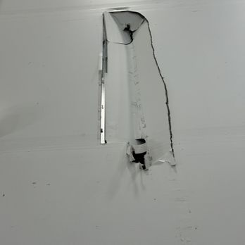 Father and Son Maintenance - Holes in wall made forklift drivers - Handyman Near Me Father and Son Maintenance - Holes in wall made forklift drivers - Handyman Near Me