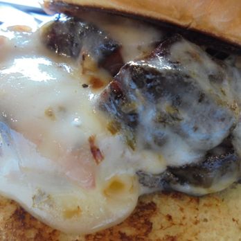 Famous Dave's Bar-B-Que - Beef brisket sandwich, close-up. - Barbeque Near Me - Plymouth, Minnesota