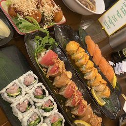 Udoon noodles. Crispy Garlic Tuna, salmon sushi, Yellowtail Jalapeño Roll, Lion King Roll