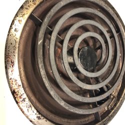 Harbourside Resort - Rusty and Crusty stove splash guard