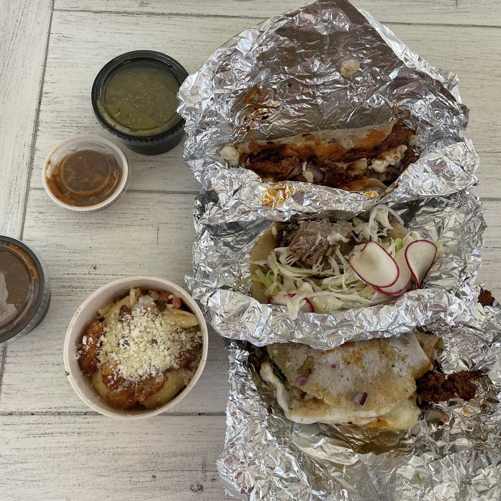Chorizo con papas, suaderito, carnitas, with a side of Mac n cheese Chorizo con papas, suaderito, carnitas, with a side of Mac n cheese