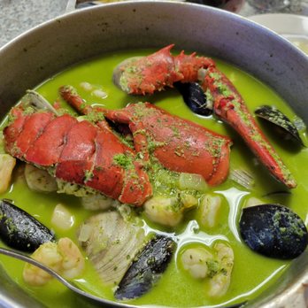 Ole Restaurant - Seafood with green sauce. - Portuguese Near Me - Farmingville, New York Ole Restaurant - Seafood with green sauce. - Portuguese Near Me - Farmingville, New York