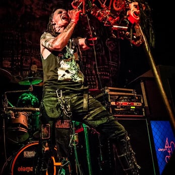 The Shredder - a man on a stage with a large scythe - Bars Near Me - Boise, Idaho The Shredder - a man on a stage with a large scythe - Bars Near Me - Boise, Idaho