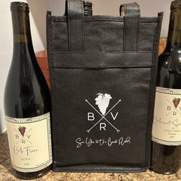 two bottles of wine and a tote bag