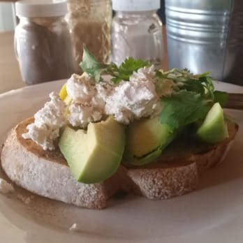 The Hood Milk Bar - Toast with avocado and feta (and a stem of coriander on top) - Milk Bars Near Me - The Junction, NSW