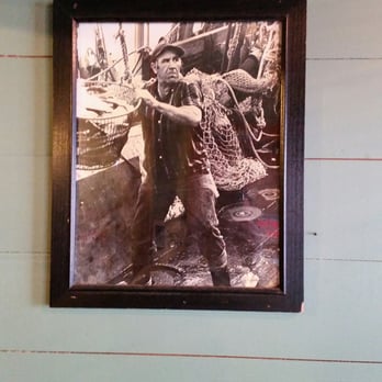 Crawfish Hut - an old photo of a fisherman - Cajun/Creole Near Me - Rayne, Louisiana
