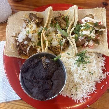 Amigos - Carnitas tacos on corn tortilla   Fried Avocado taco on corn tortillas   Refried beans  Rice - Mexican Near Me - Key West, Florida