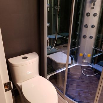 Soak Luxury Bath Product - A small corner steam shower with bluetooth capabilities and LED lights. Plus, dual flush toilet on the side. - Kitchen & Bath Near Me - Edmonton, Alberta Soak Luxury Bath Product - A small corner steam shower with bluetooth capabilities and LED lights. Plus, dual flush toilet on the side. - Kitchen & Bath Near Me - Edmonton, Alberta
