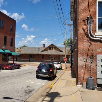1869 Draft Room - a car parked on the side of the road - Sports Bars Near Me - Washington, Missouri