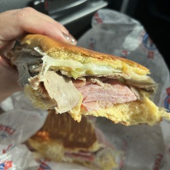 Latin Cafe 2000 - Media Noche: roast pork, ham, mustard, Swiss cheese, and sweet pickles on sweat bread. - Latin American Near Me - Miami, Florida Latin Cafe 2000 - Media Noche: roast pork, ham, mustard, Swiss cheese, and sweet pickles on sweat bread. - Latin American Near Me - Miami, Florida