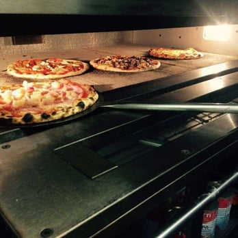 Queen Margherita - Pizzas in the Italian oven - photo from website - Pizza Near Me - Hampton, VIC Queen Margherita - Pizzas in the Italian oven - photo from website - Pizza Near Me - Hampton, VIC