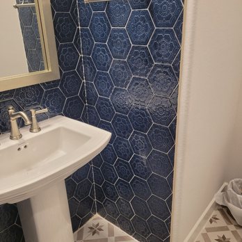 Luna Tile - a bathroom with a pedestal sink - Flooring Near Me Luna Tile - a bathroom with a pedestal sink - Flooring Near Me