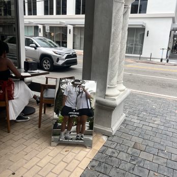 STAND - Outside sign - Cafes Near Me - Miami, Florida STAND - Outside sign - Cafes Near Me - Miami, Florida
