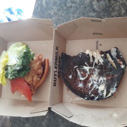 Burned top bun with lettuce and tomatoes! Burned top bun with lettuce and tomatoes!