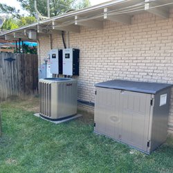 One Planet Solar & Wind - Another example of battery backup system. Off grid inverters and lithium batteries in enclosure