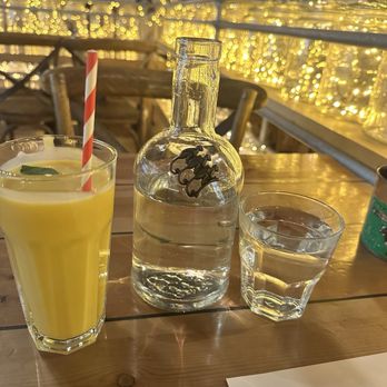 Mowgli - Mango lassi and water in a cute bottle with monkeys on it - Indian Near Me - Birmingham, XWM