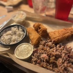 The Fishin' Pig - The Pork & Catfish dinner w/ slaw & potato salad.
