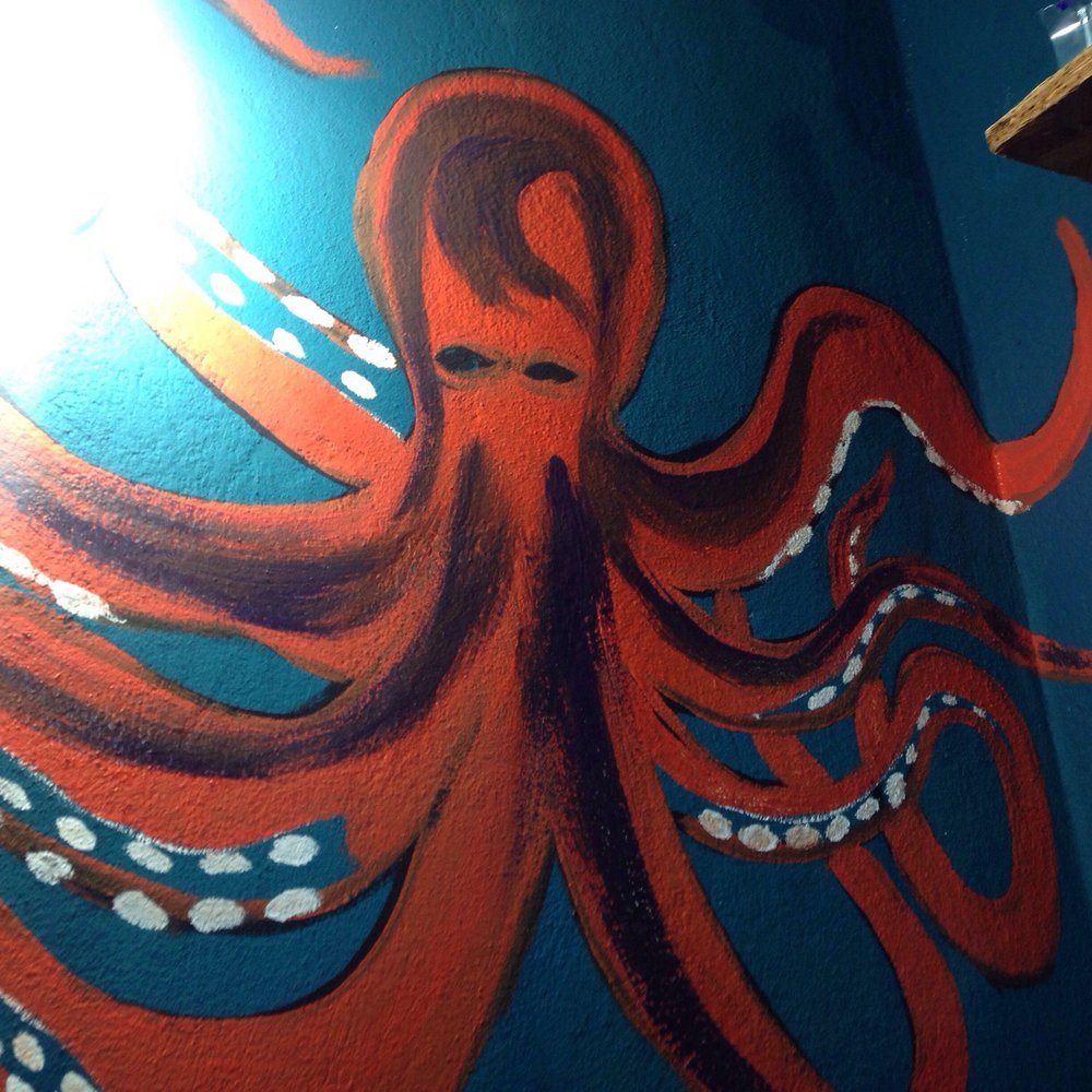 Bajaus - Artwork on the wall in the bathroom - Salad Near Me - La Paz, BCS Bajaus - Artwork on the wall in the bathroom - Salad Near Me - La Paz, BCS