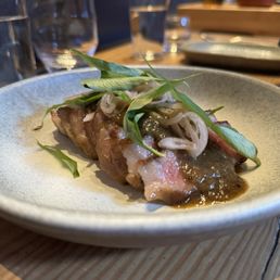 NY strip supplement - delicious! Perfectly rare and served with an incredible sauce. NY strip supplement - delicious! Perfectly rare and served with an incredible sauce.