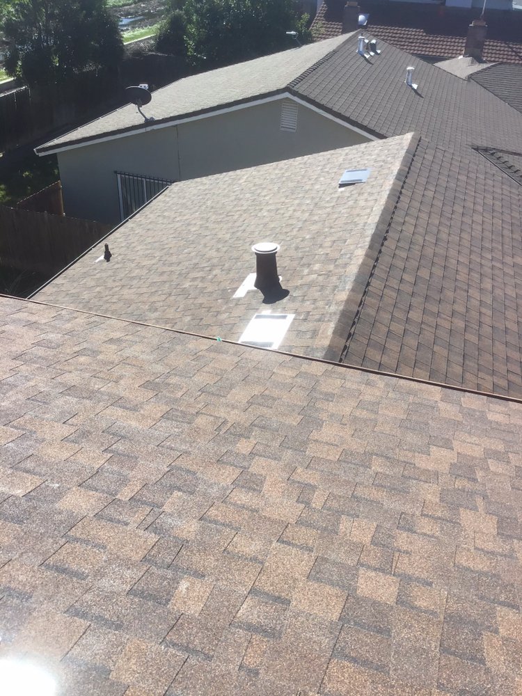 Slide of Rodriguez Roofing Pros