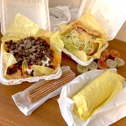 Sabrosada - Carne asada nachos (half order), taco salad, churros, carnitas burrito