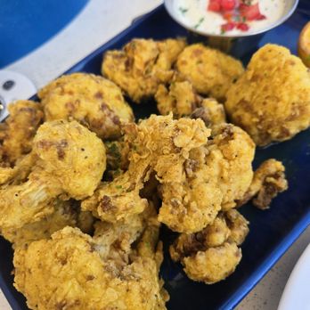 Benny's On The Beach - Pier - Cauliflower with a curry crispy batter - delicious!! - Seafood Near Me - Lake Worth Beach, Florida Benny's On The Beach - Pier - Cauliflower with a curry crispy batter - delicious!! - Seafood Near Me - Lake Worth Beach, Florida