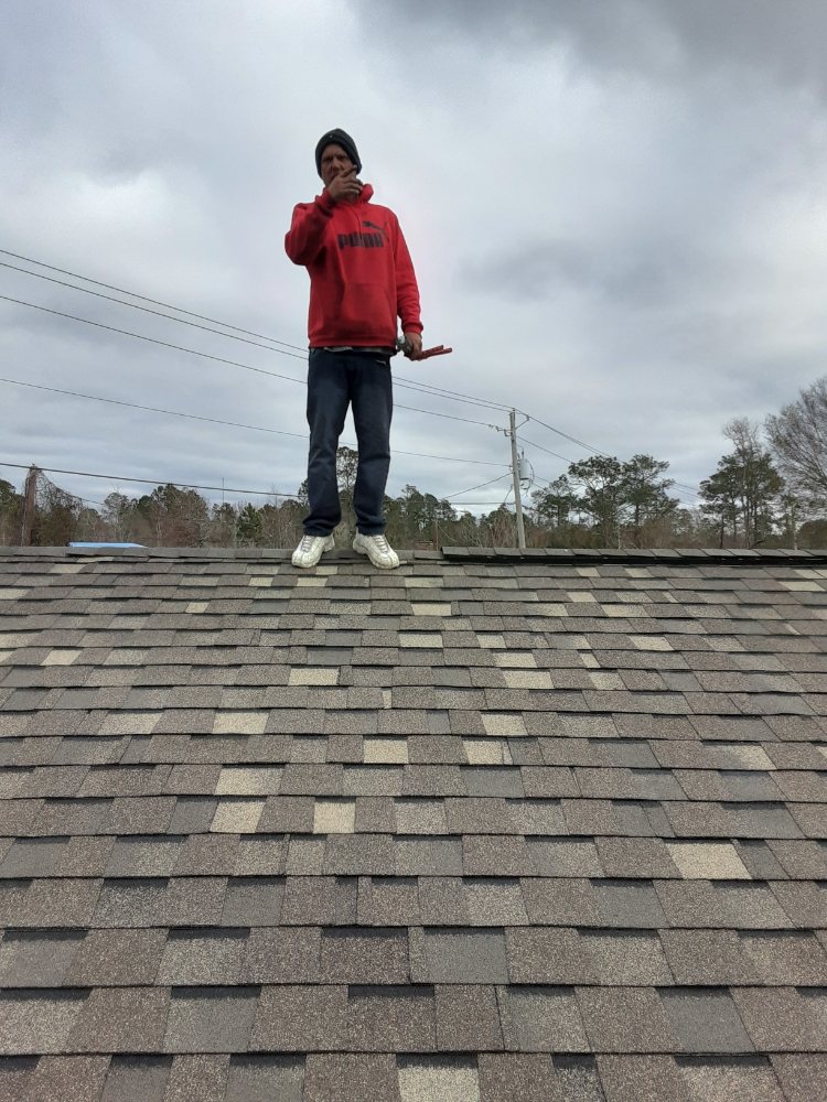 Slide of On Point Roofing