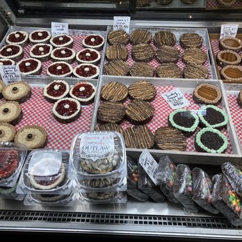Outlaw BBQ - The desert case. Mini cheesecakes, brownies. - Barbeque Near Me - Spokane, Washington