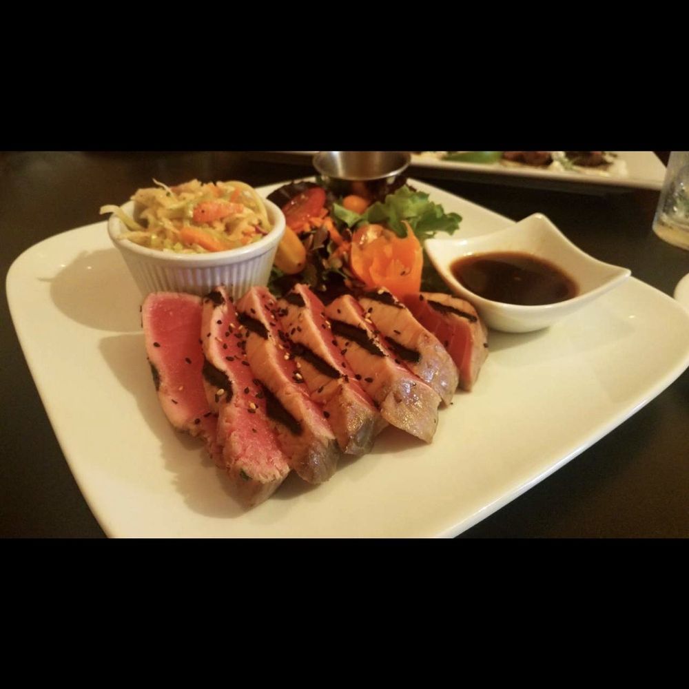 Seared teriyaki yellowfin tuna with green salad and honey lime veggie slaw Seared teriyaki yellowfin tuna with green salad and honey lime veggie slaw